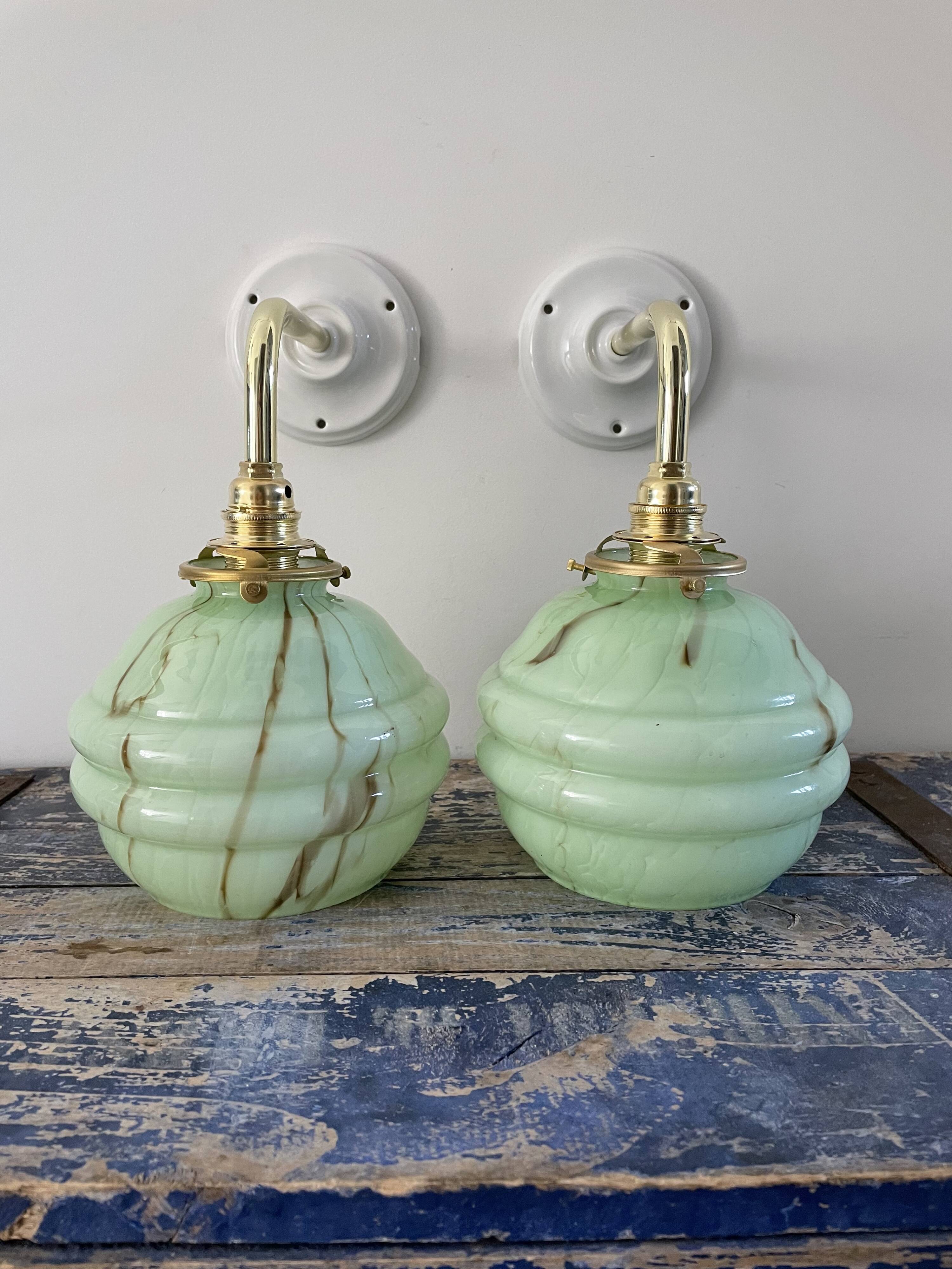 Pair of new electrified mint Art Deco sconces