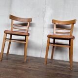 Pair of chairs in light wood and vintage red fabric 1960
