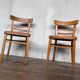 Pair of chairs in light wood and vintage red fabric 1960