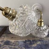 Pair of chiseled glass wall sconces