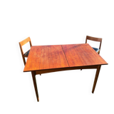 Table set with 6 chairs and its extension.