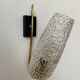 Gold metal and chiseled glass wall lamp