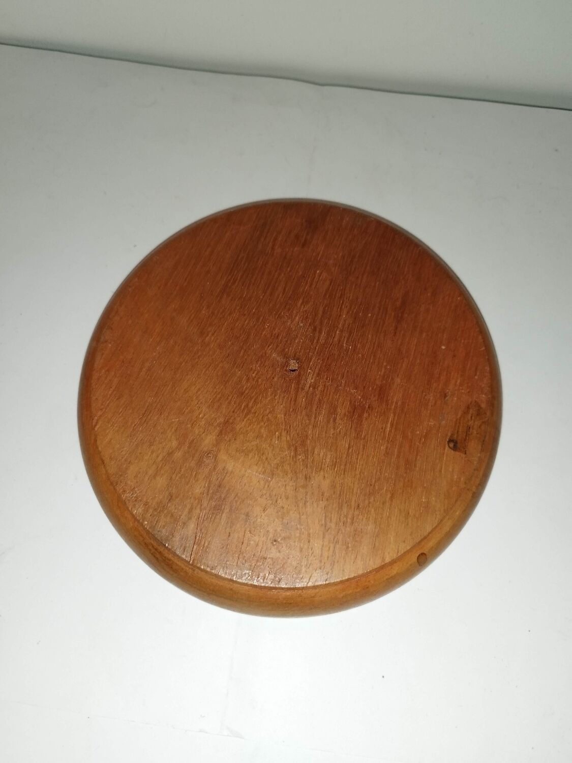 Ancient solitaire game in wood and stone marbles