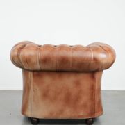 Chesterfield armchair in English style made of cowhide leather