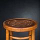 Antique high bistro stool in curved wood with a floral decorated top, Thonet style – around 1900