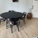 Roche Bobois Globe Trotter collection table and its four chairs