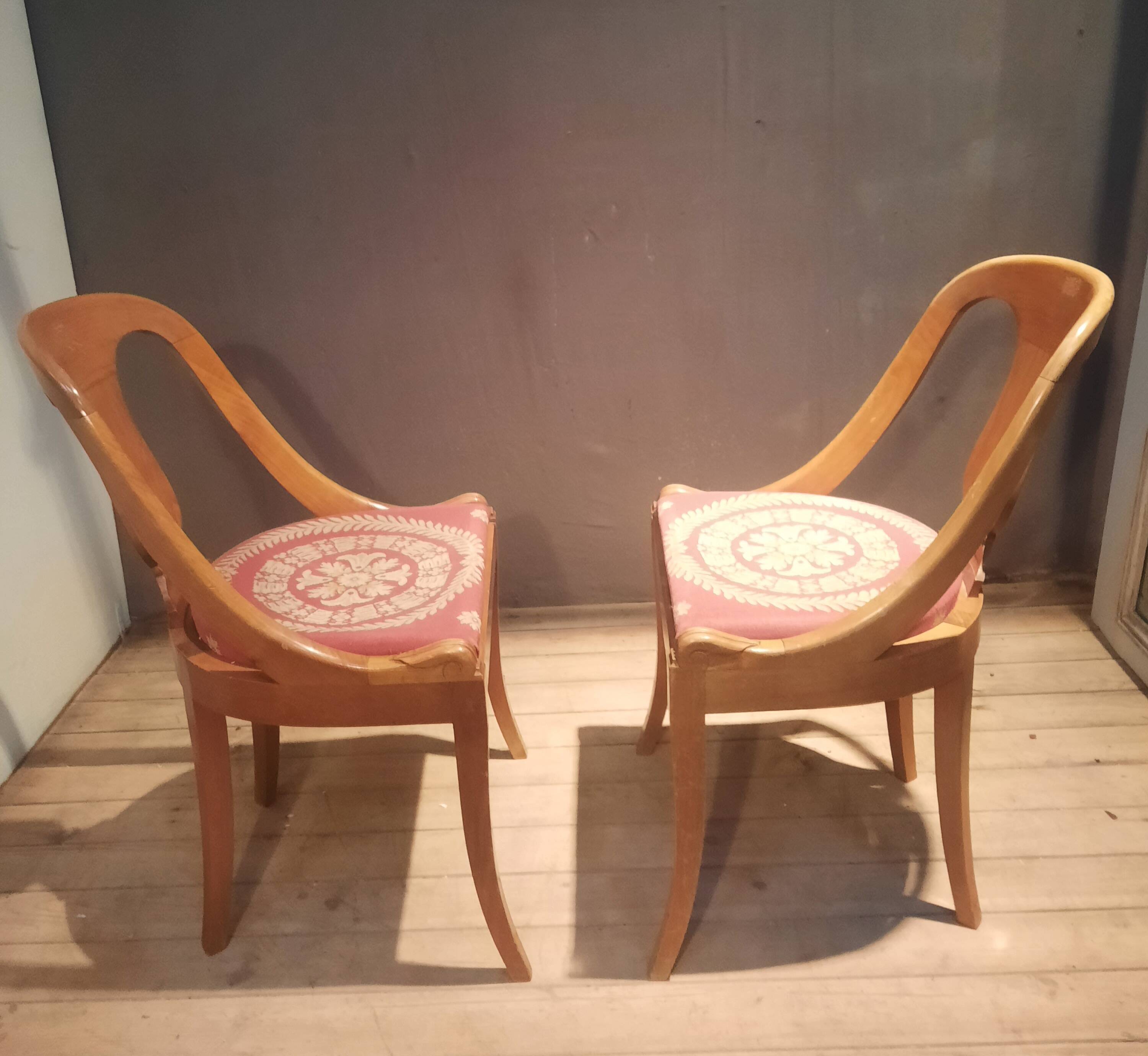 Pair of light wood gondola chairs