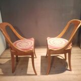 Pair of light wood gondola chairs