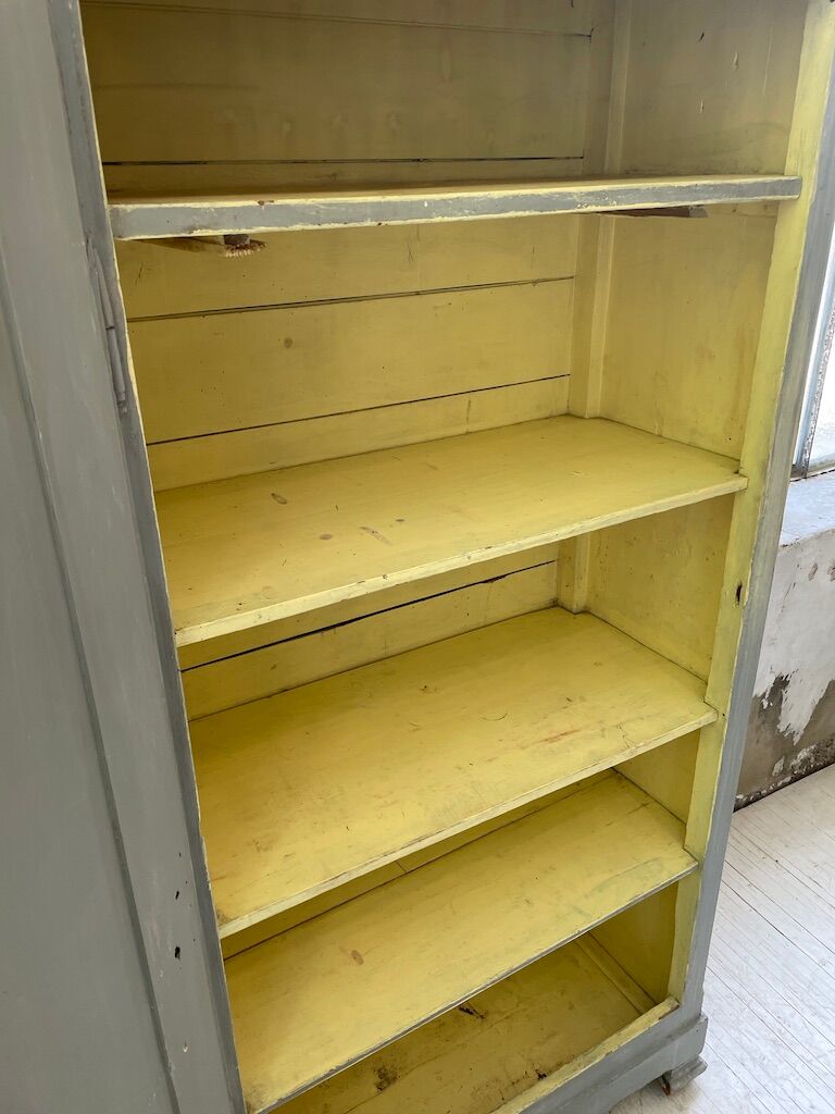 Blue patinated cap cabinet