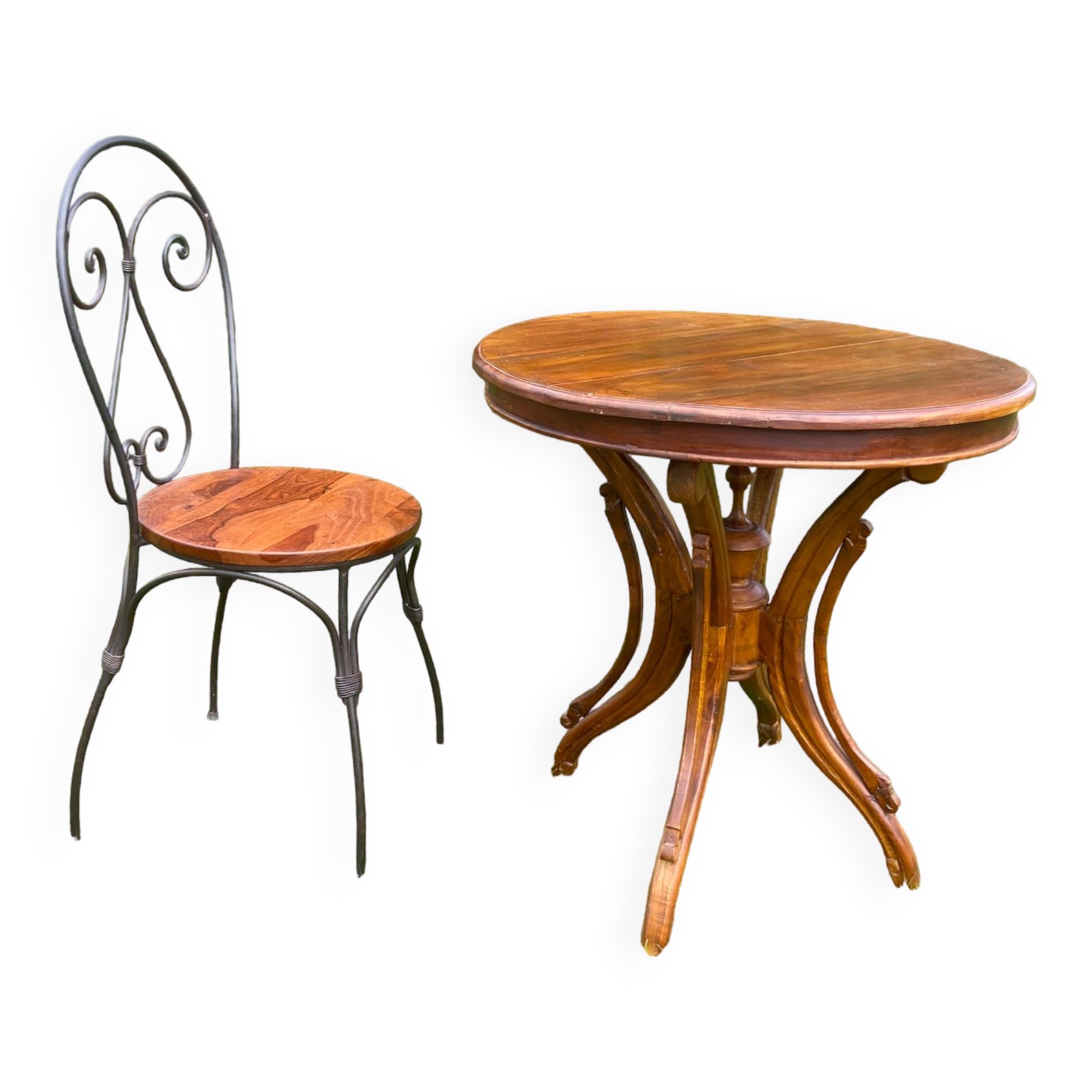 Round table and wrought iron chair