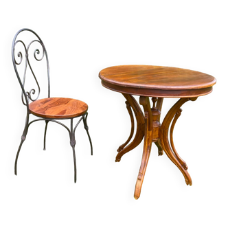 Round table and wrought iron chair