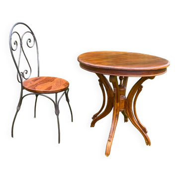 Table ronde et sa chaise en fer forgé