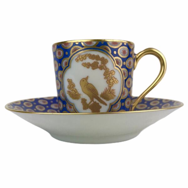 Paire de tasses Bernardaud aux oiseaux
