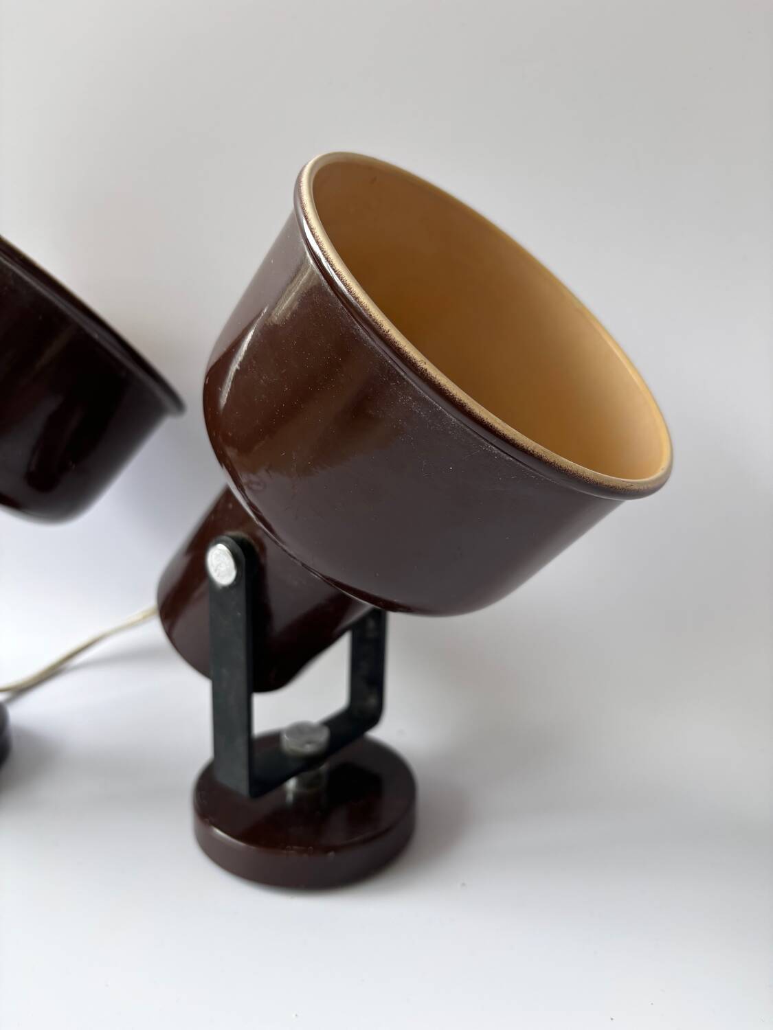 Pair of brown metal wall lights