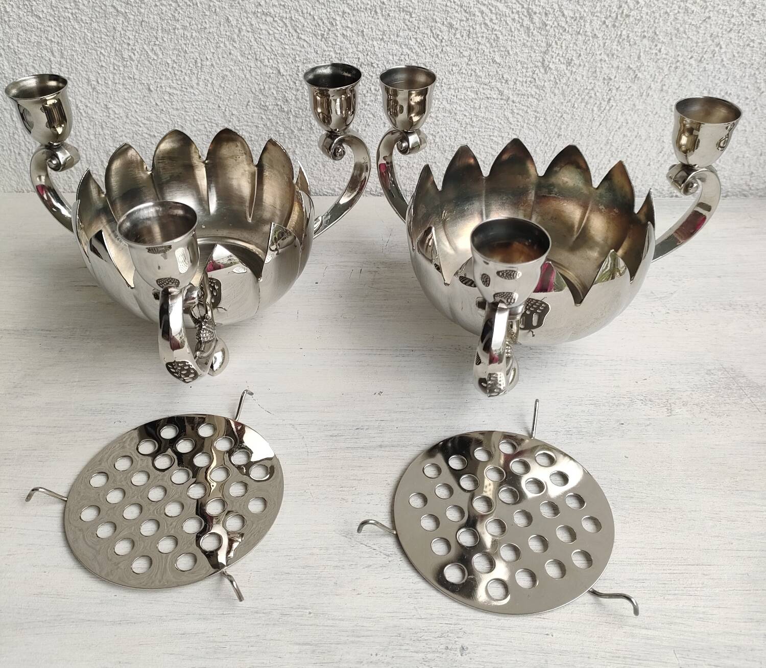 Pair of silver-plated lotus candle holders