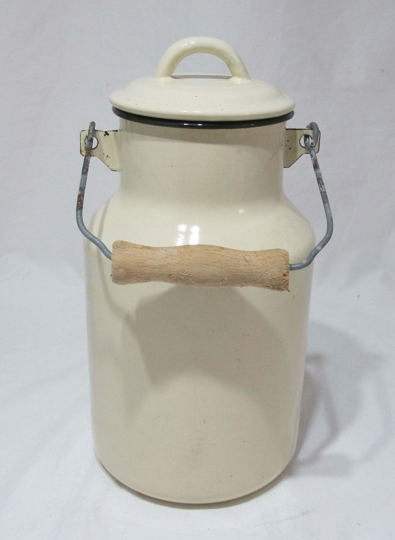 Milk jug in vintage enamelled sheet metal