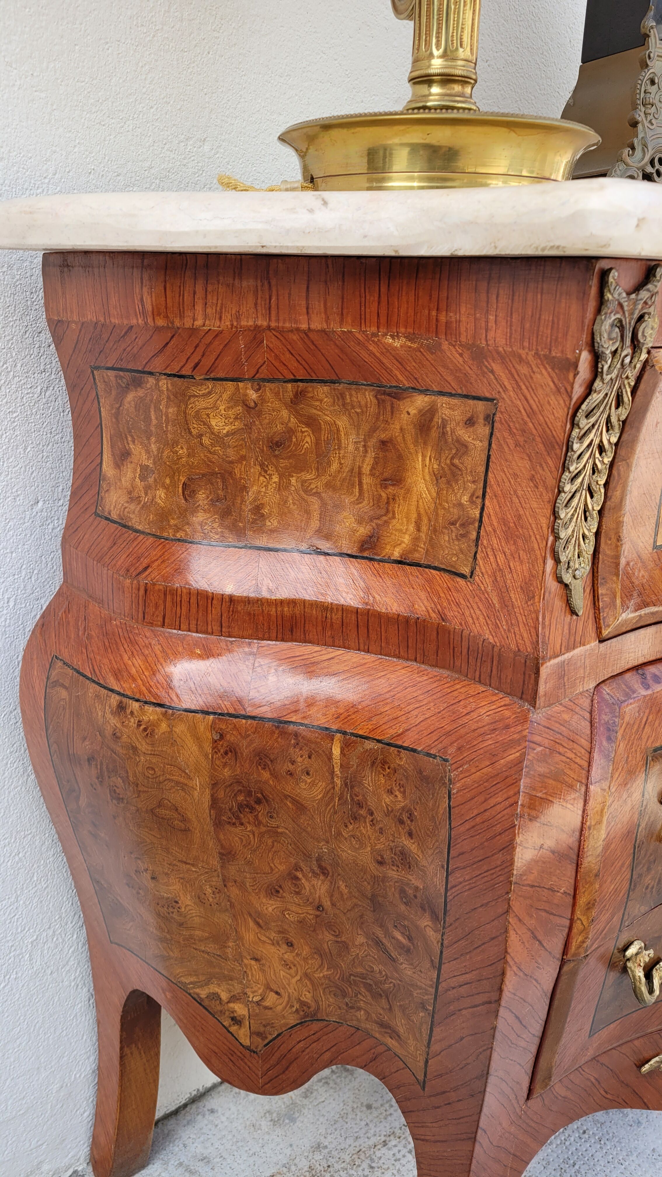 Louis XV style curved chest of drawers in marquetry