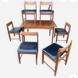 Table set with 6 chairs and its extension.