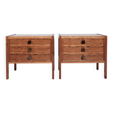 Pair of vintage Scandinavian bedside tables, three drawers, honey-toned wood.