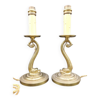 Pair of Dolphin lamp candlesticks in gilded bronze working around 1920