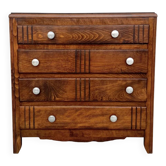 Petite commode 4 tiroirs — bois massif, motifs art déco, France années 50