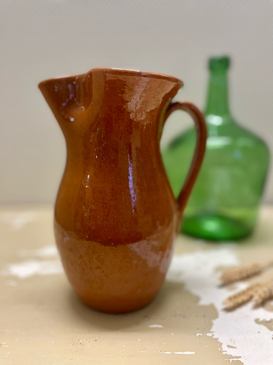 Vintage glazed terracotta pitcher