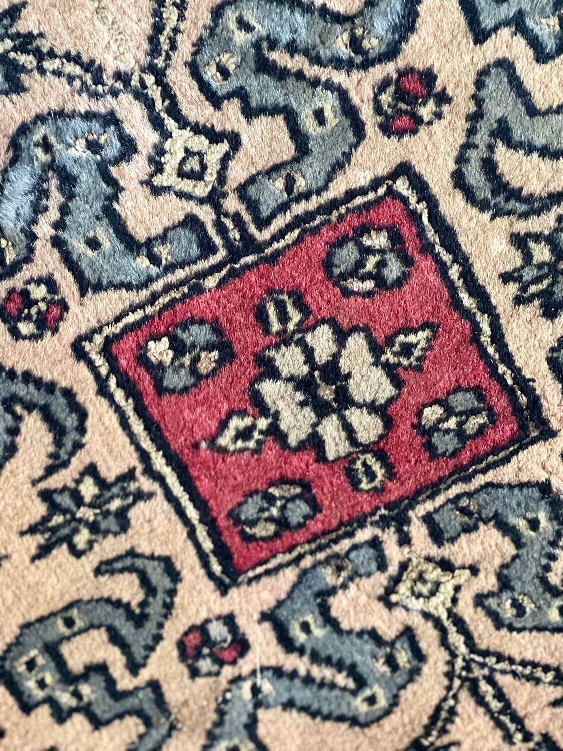 Antique Persian rug, signed.