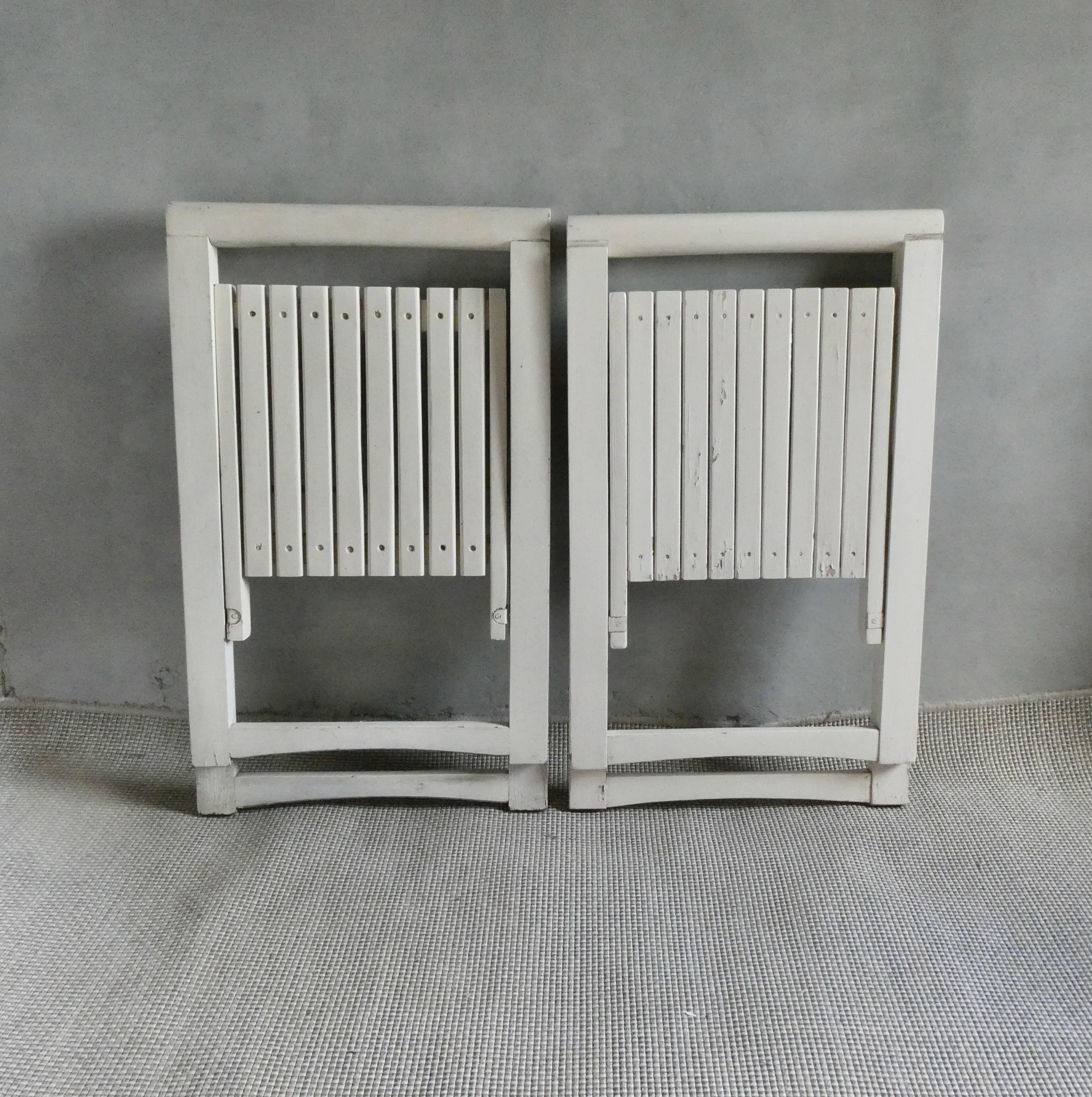 Pair of wooden folding chairs from the 60s