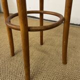High stool in curved wood and cane seat