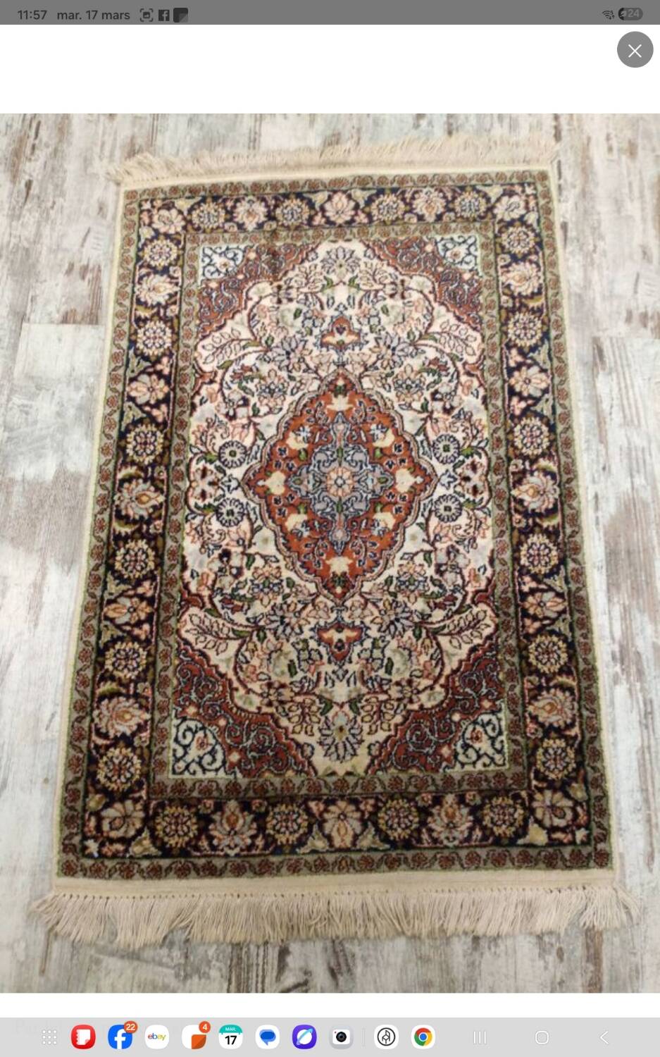 Handmade Persian carpet in wool and silk.