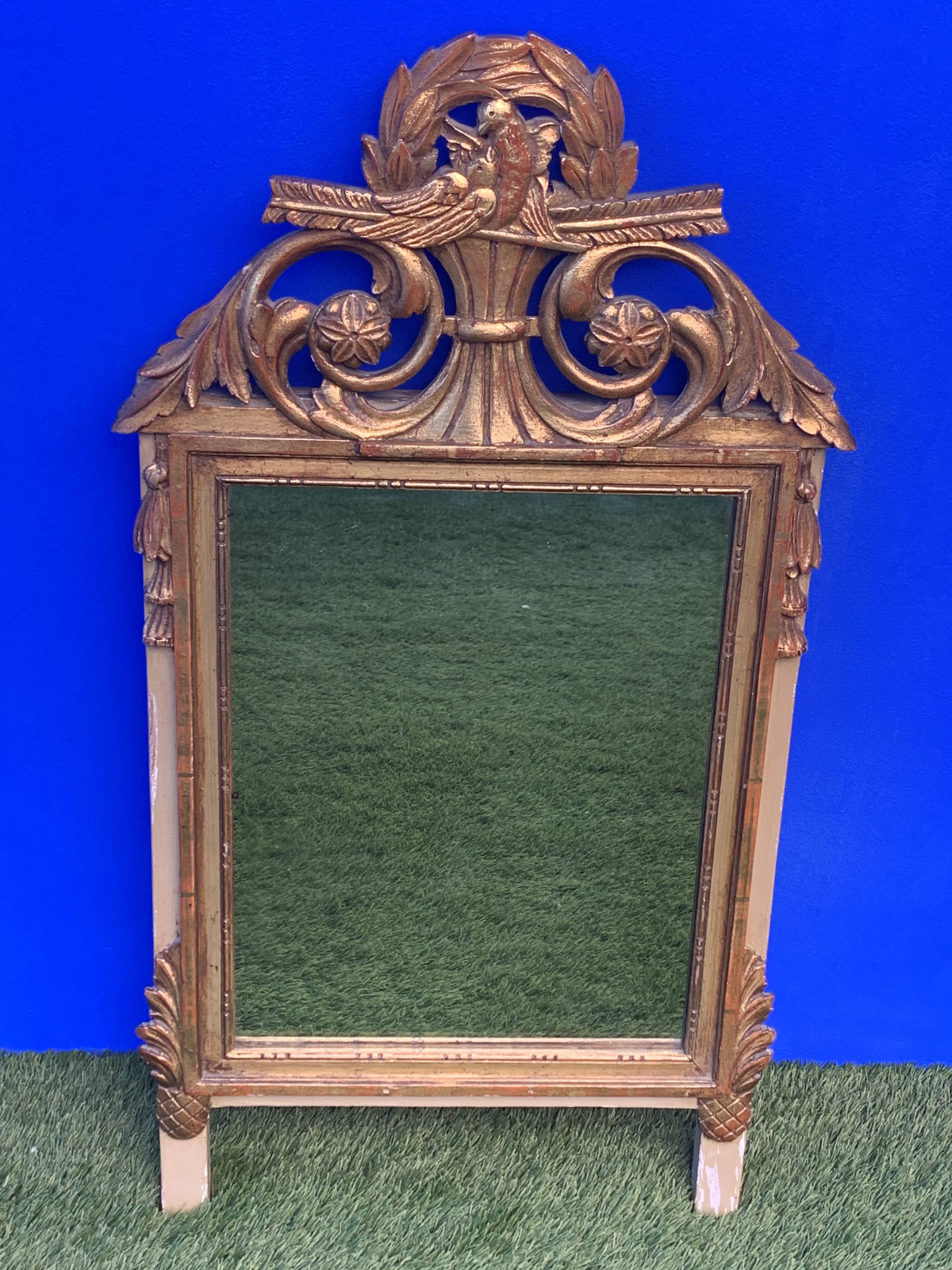Antique mirror with gilded wood pediment, Louis XVI style