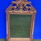 Antique mirror with gilded wood pediment, Louis XVI style