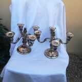 Pair of candlesticks in silver metal