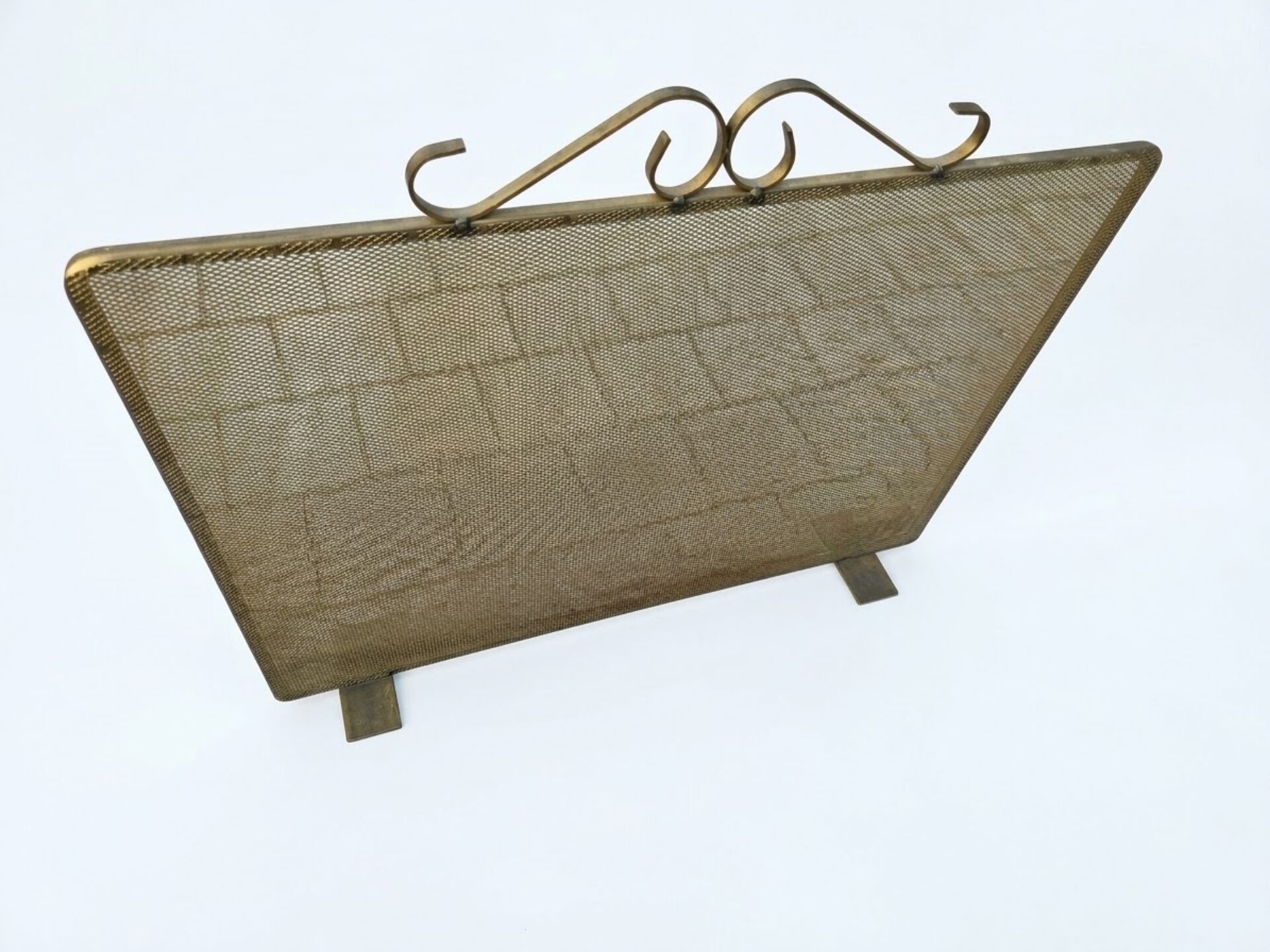 Fireplace screen in patinated gold iron