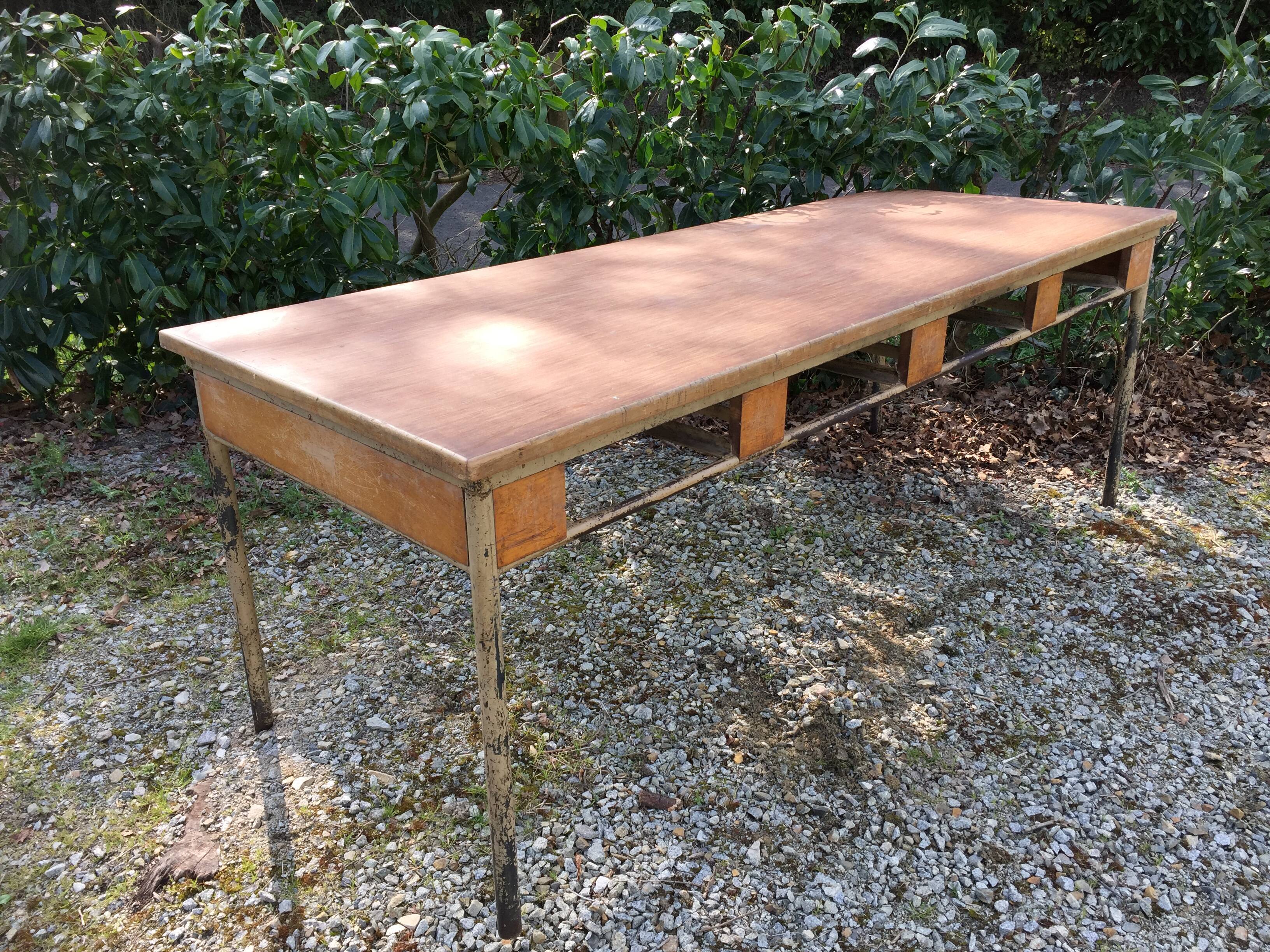 Vintage modernist table with metal tubular base