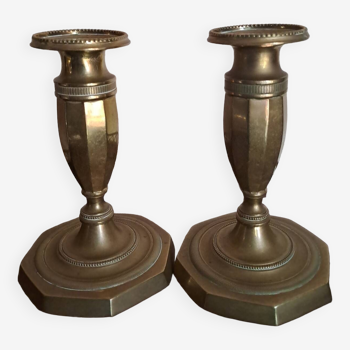 Pair of Empire toilet candlesticks in 19th century bronze