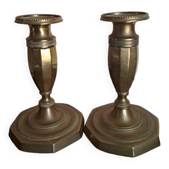 Pair of Empire toilet candlesticks in 19th century bronze