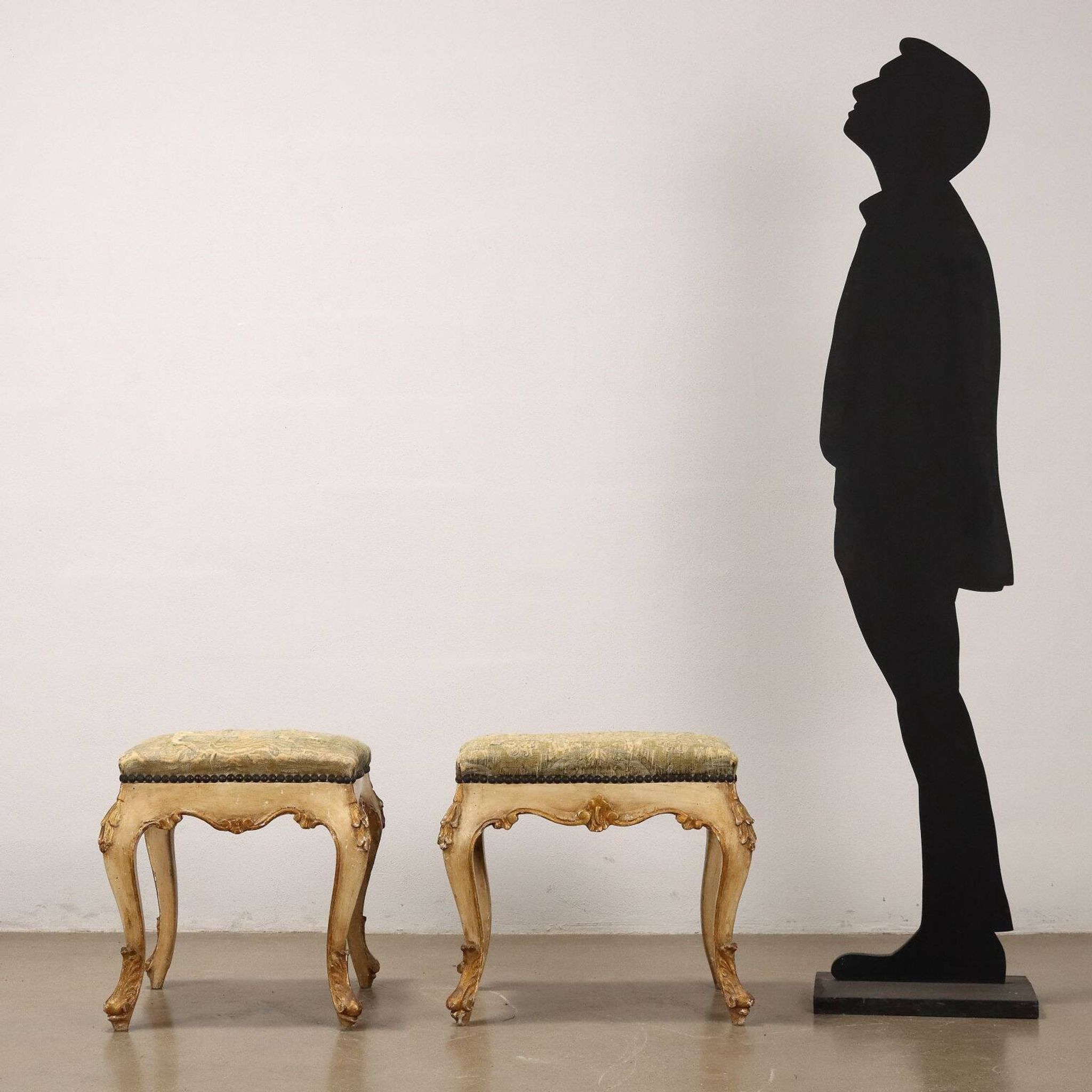 Pair of antique baroque-style poufs in gilded wood, 19th century.