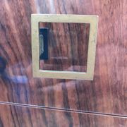 Lacquered 3-drawer chest with rosewood veneer.