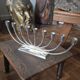 Large modern chrome metal candlestick for Hanukkah.