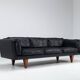 Illum Wikkelso model V11 sofa in black leather by Holger Christiansen, Denmark, 1960
