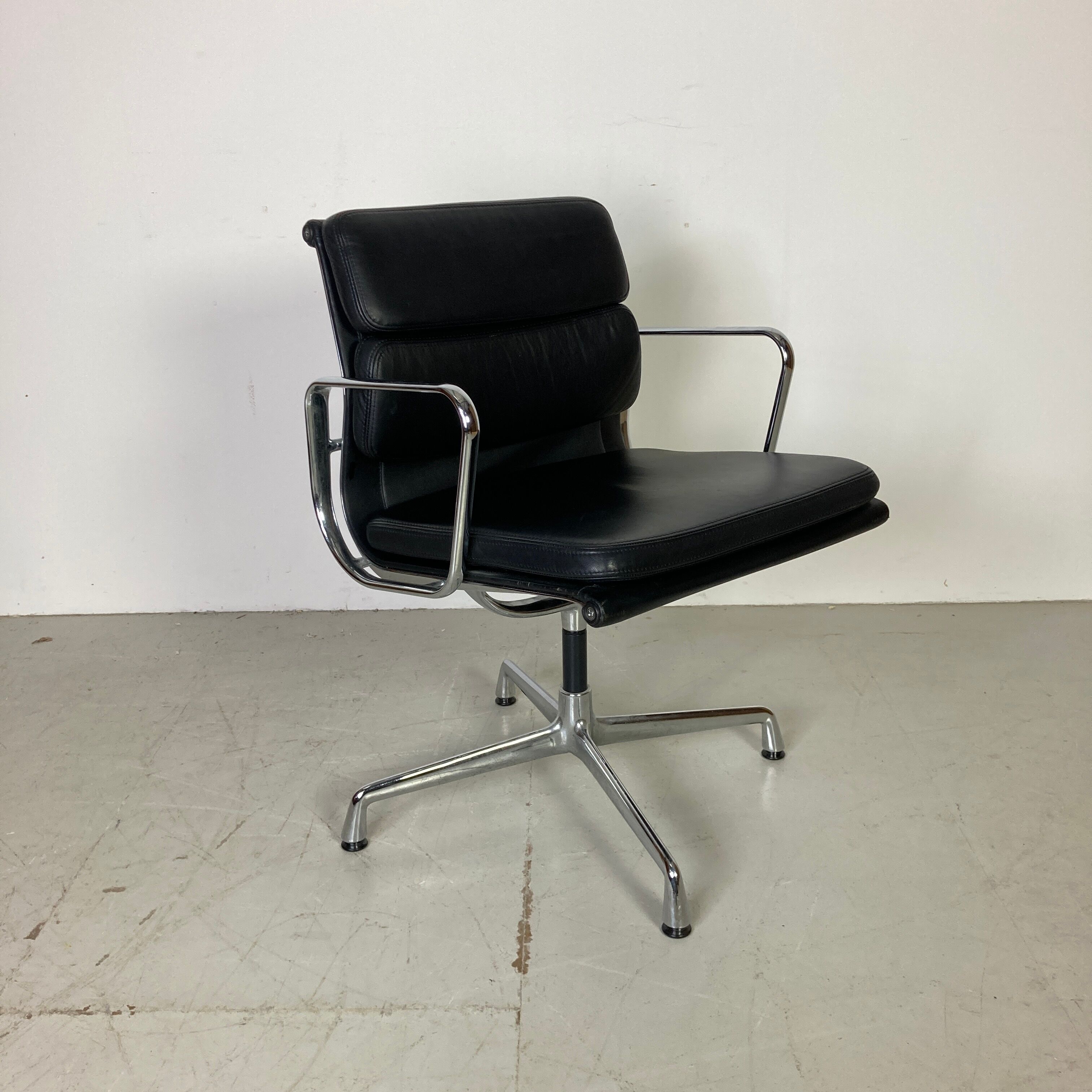 Eames black leather Soft Pad Group chair made by Vitra for Herman Miller