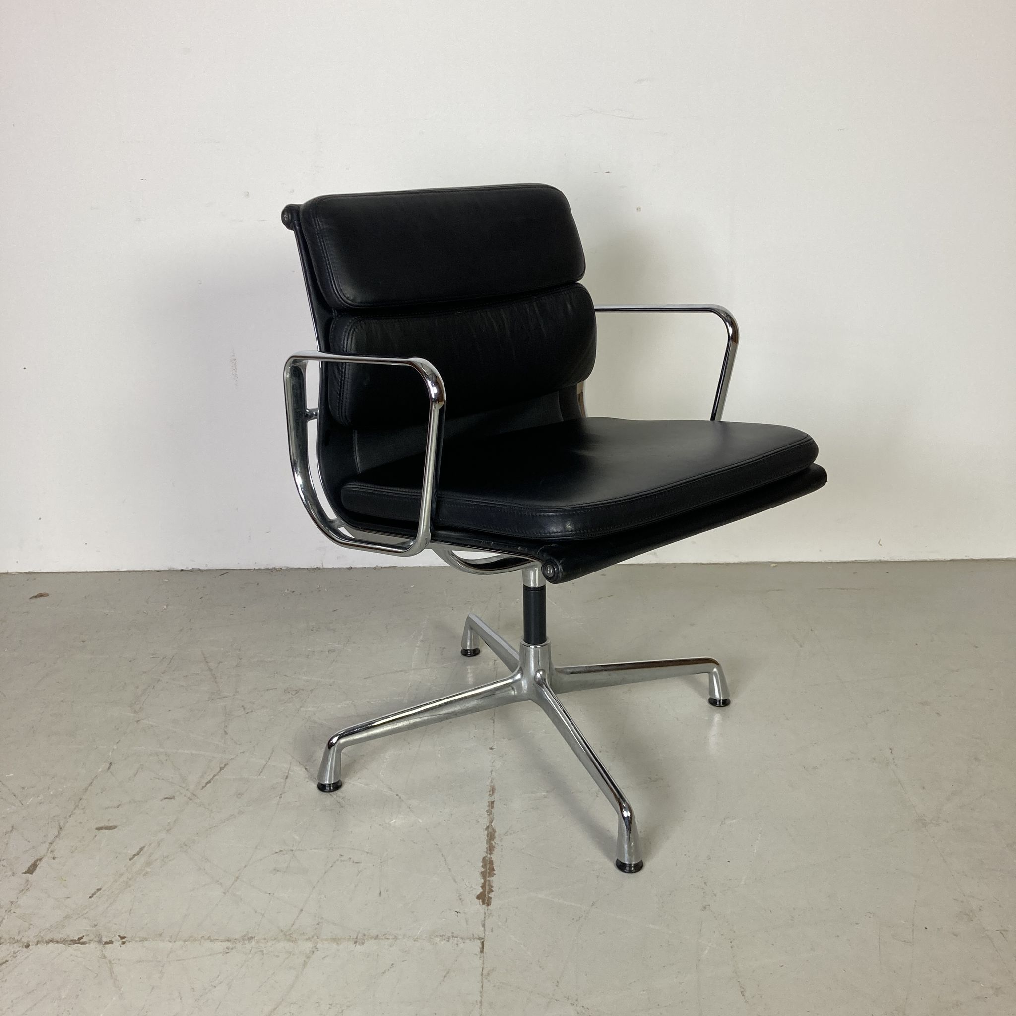 Eames black leather Soft Pad Group chair made by Vitra for Herman Miller