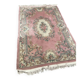 Tapis oriental. Rose poudré.