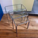 Nesting tables in chrome metal and white glass