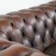 Dark brown cow leather vintage 2-seater Chesterfield sofa in English style