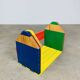 Modular wall-mounted pencil shelf in Pierre Sala style, for children.