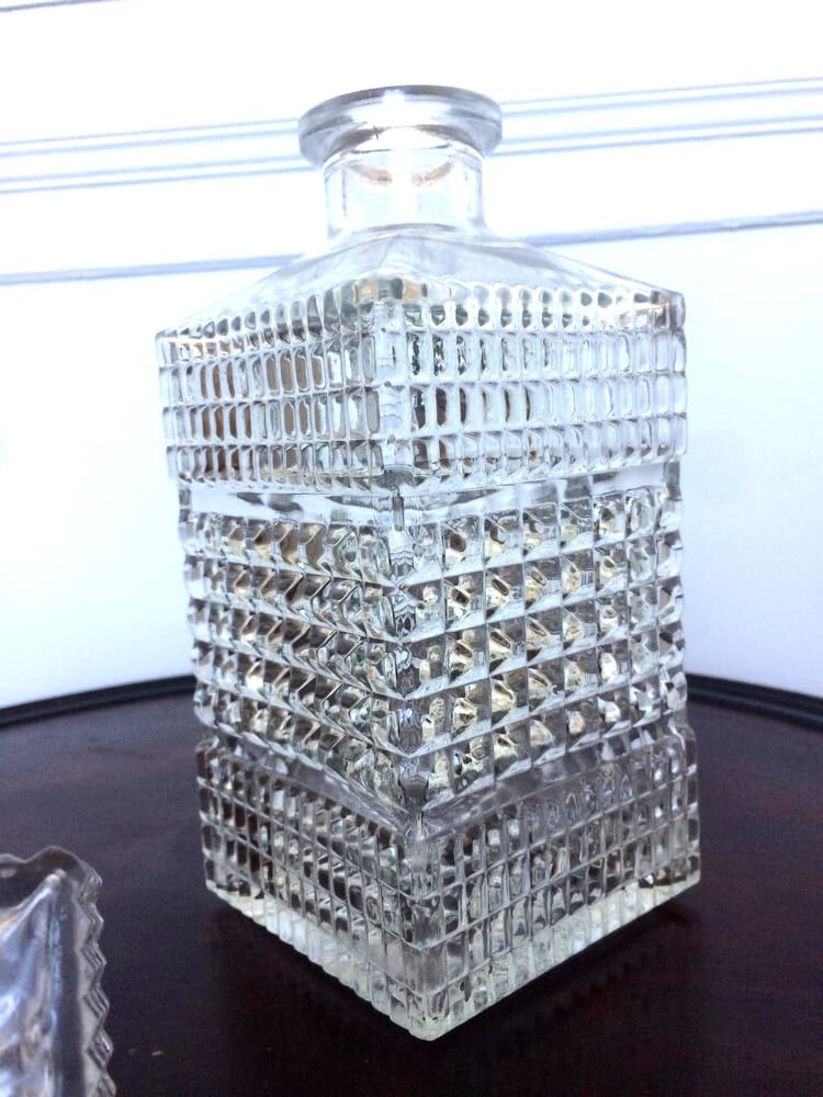 Pair of vintage diamond-cut whiskey decanters