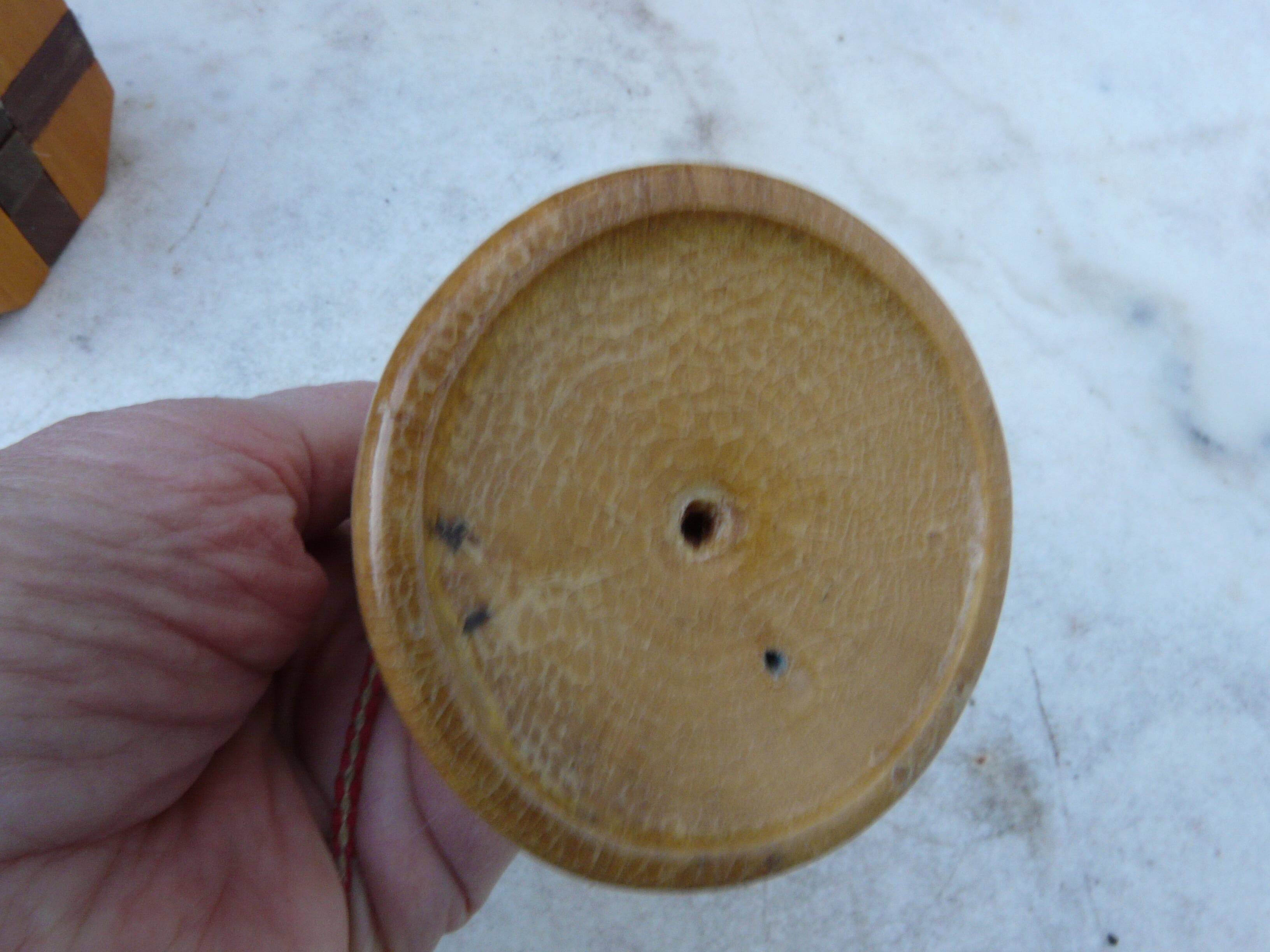 Old wooden bilboquet