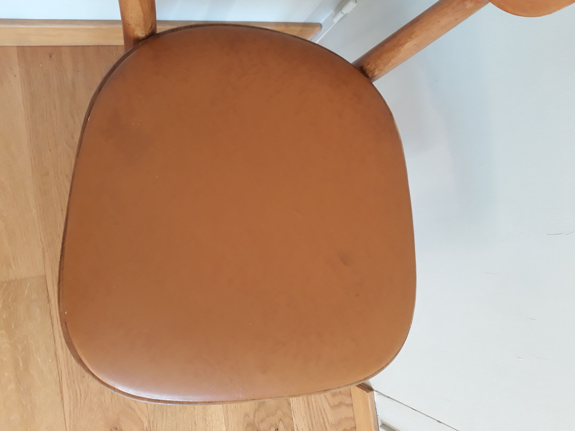 Bistro chair Baumann 1963 curved wood and skaï imitation leather caramel